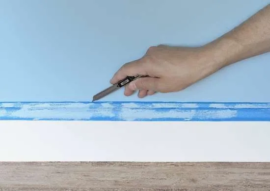 use snap off knife to clean paint line